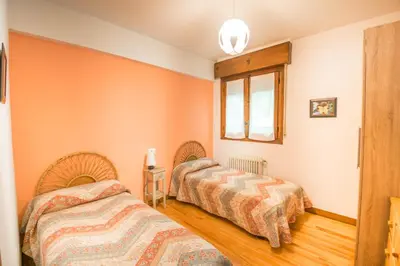 Cama o camas de una habitación en Acogedora casa rural a los pies de la Selva Irati