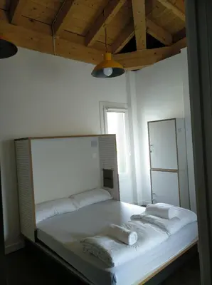 Cama o camas de una habitación en Agora Hostel