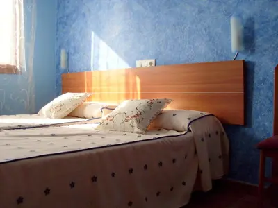 Cama o camas de una habitación en Allotjaments Turístics Mircla