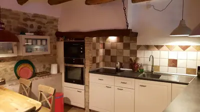 Una cocina o zona de cocina en La Sargantana Turismo Rural
