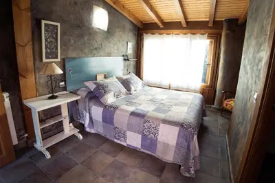 Cama o camas de una habitación en Casa Rural El Huerto de la Fragua