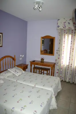 Cama o camas de una habitación en Casa Raspa