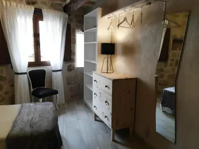Una televisión o centro de entretenimiento en Casa Rural Santana