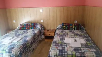 Cama o camas de una habitación en Pension Plaza