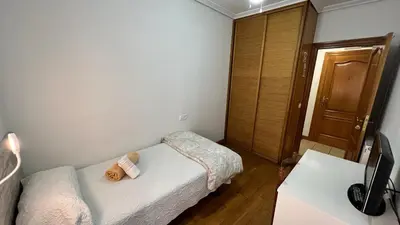 Cama o camas de una habitación en Pensión Buen Camino