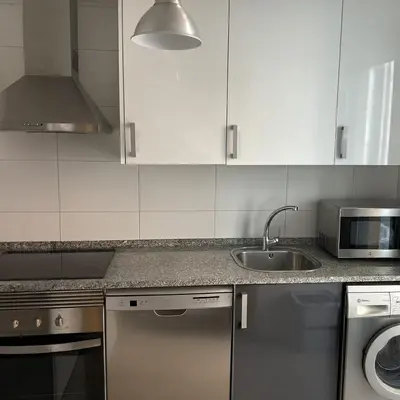 Una cocina o zona de cocina en Apartamentos Mayoral