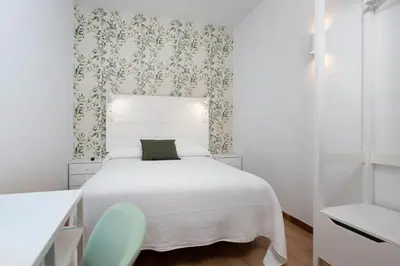 Cama o camas de una habitación en Hotel Mi Casa