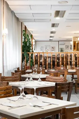 Un restaurante o sitio para comer en Hotel Mi Casa