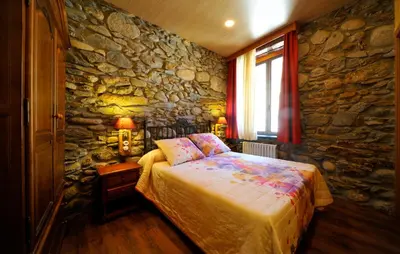 Cama o camas de una habitación en Hostal Vall D'Aneu by Arcas & Sambola