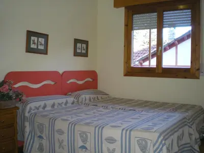 Cama o camas de una habitación en Apartamentos Turisticos Sol y Nieve