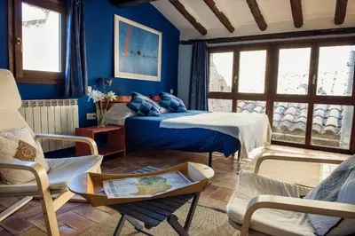 Cama o camas de una habitación en Lo Raconet de la Plaça