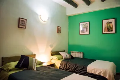 Cama o camas de una habitación en Lo Raconet de la Plaça
