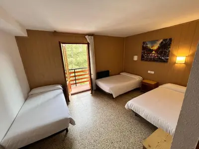 Cama o camas de una habitación en Meson de Castiello