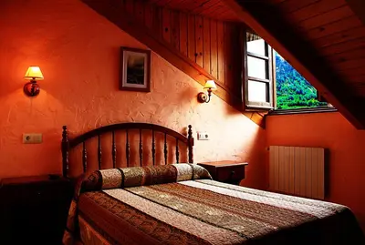 Cama o camas de una habitación en Hostal Casa Lacreu