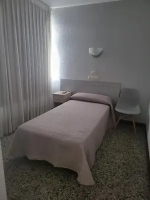 Cama o camas de una habitación en Hotel Cogullada