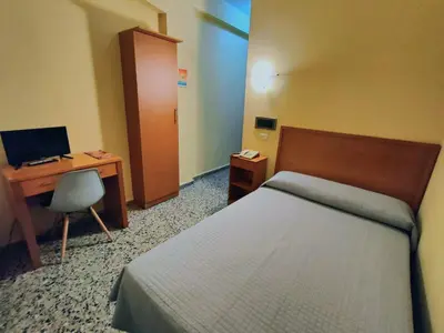 Cama o camas de una habitación en Hotel Cogullada
