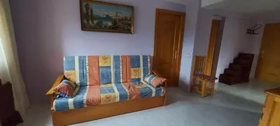Zona de estar de Casa Féliz duplex y apartamento Rural