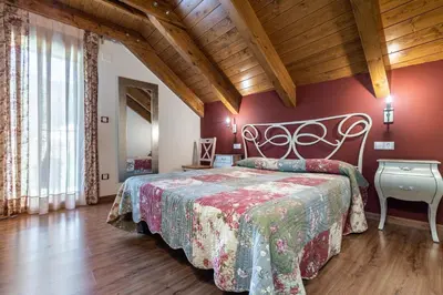 Cama o camas de una habitación en Casa Bergua