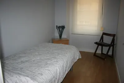 Cama o camas de una habitación en Fabiola Zentro