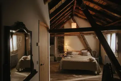 Cama o camas de una habitación en Casa Rural Valle de Tena