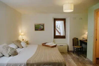 Cama o camas de una habitación en Casa Rural Valle de Tena