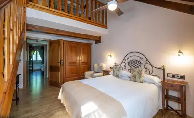 Cama o camas de una habitación en Hotel Casa Arcas