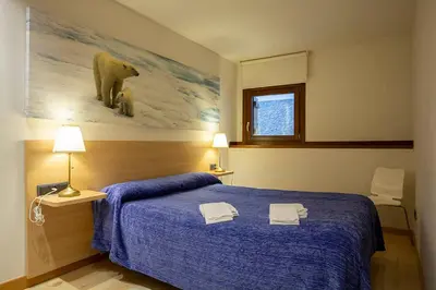 Cama o camas de una habitación en Metsola Apartamentos Rurales