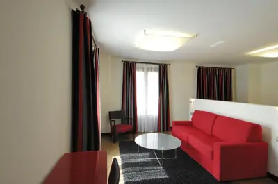 Zona de estar de Hotel Cienbalcones