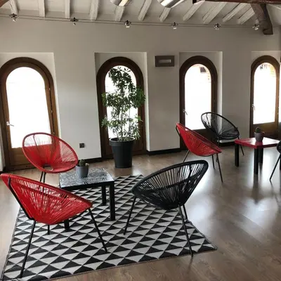 Zona de estar de Hotel Cienbalcones