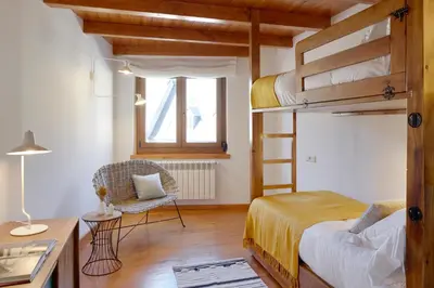 Cama o camas de una habitación en Ribaeta by FeelFree Rentals