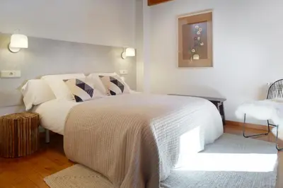 Cama o camas de una habitación en Ribaeta by FeelFree Rentals