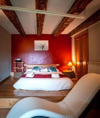 Cama o camas de una habitación en Balcon del Pirineo Rural Ordesa