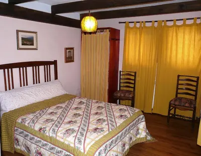 Cama o camas de una habitación en La Colmenita