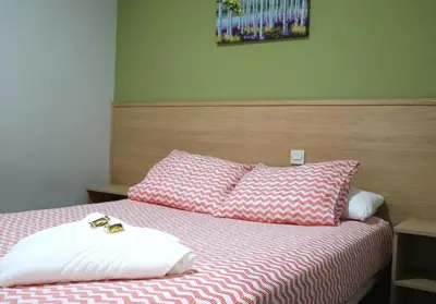 Cama o camas de una habitación en Hostal Milmarcos