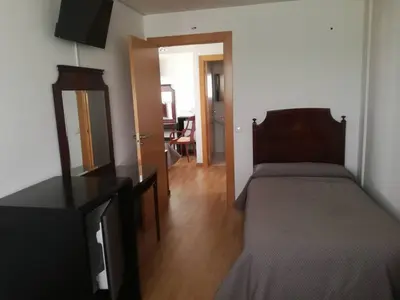 Cama o camas de una habitación en Pension La Espiga