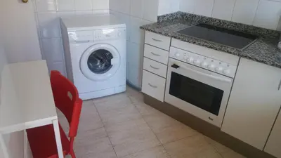 Una cocina o zona de cocina en Apartseu