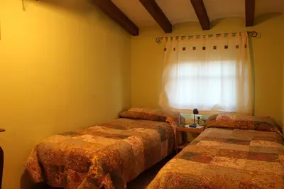 Cama o camas de una habitación en Ca la Nuri