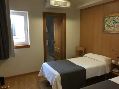 Cama o camas de una habitación en Iraipe Izaga Hostal