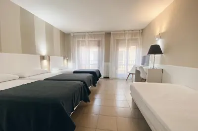 Cama o camas de una habitación en Hotel Rio Arga