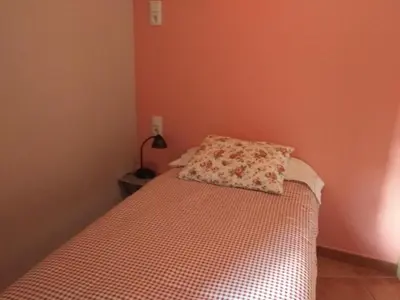 Cama o camas de una habitación en casa sampietro 2