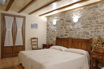 Cama o camas de una habitación en Apartamento el Hogar Casa Cajal