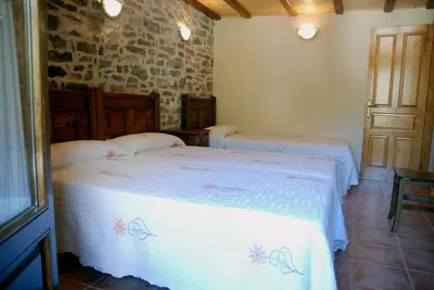 Cama o camas de una habitación en Apartamento el Hogar Casa Cajal