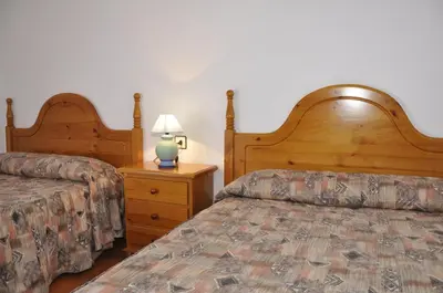 Cama o camas de una habitación en Hotel Castillo d'Acher