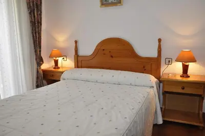 Cama o camas de una habitación en Hotel Castillo d'Acher