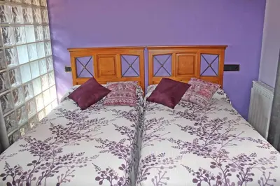 Cama o camas de una habitación en Hotel Apartamentos Melihah