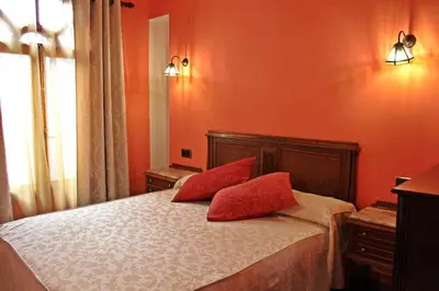Cama o camas de una habitación en Hotel Apartamentos Melihah
