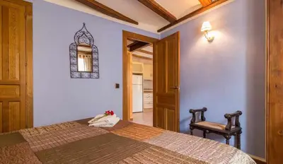 Cama o camas de una habitación en Hotel Apartamentos Melihah