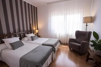 Cama o camas de una habitación en Hotel Segle XX