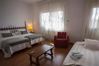 Cama o camas de una habitación en Hotel Segle XX