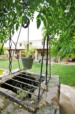 Jardín al aire libre en Hotel El Convent 1613